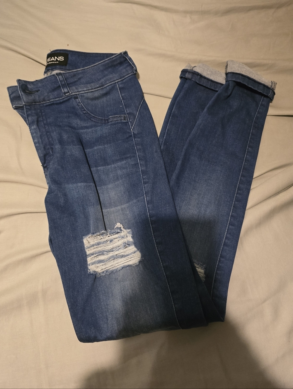 Women’s Dark Blue Distressed Jeans